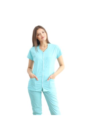 Mint medicinska obleka z upognjeno bluzo z zadrgo, tremi naloženimi žepi in mint hlačami z elastiko