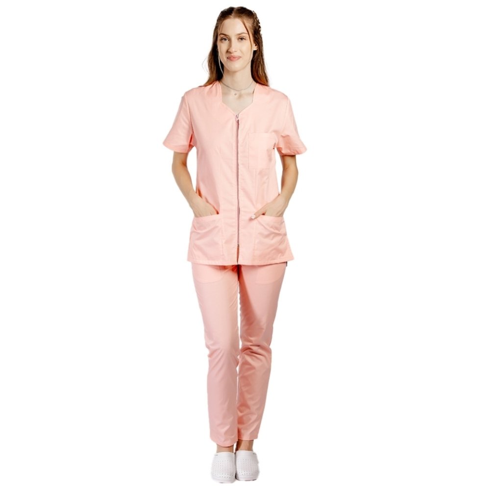 Medicinski kombinezon v barvi breskve z bluzo z zavihano zadrgo, tremi žepi in hlače v barvi breskve z elastiko