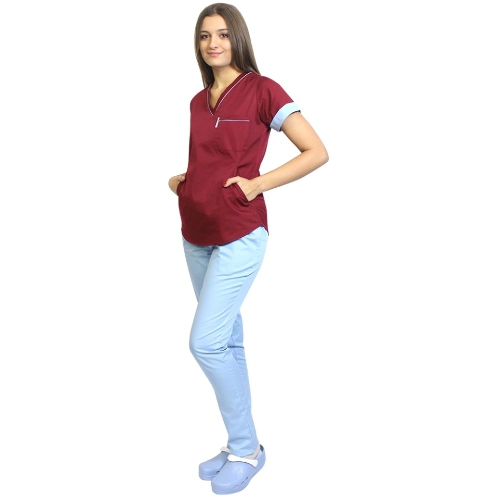 Medicinski kombinezon, sestavljen iz sive bluze z modrimi robovi in hlač, model Amani