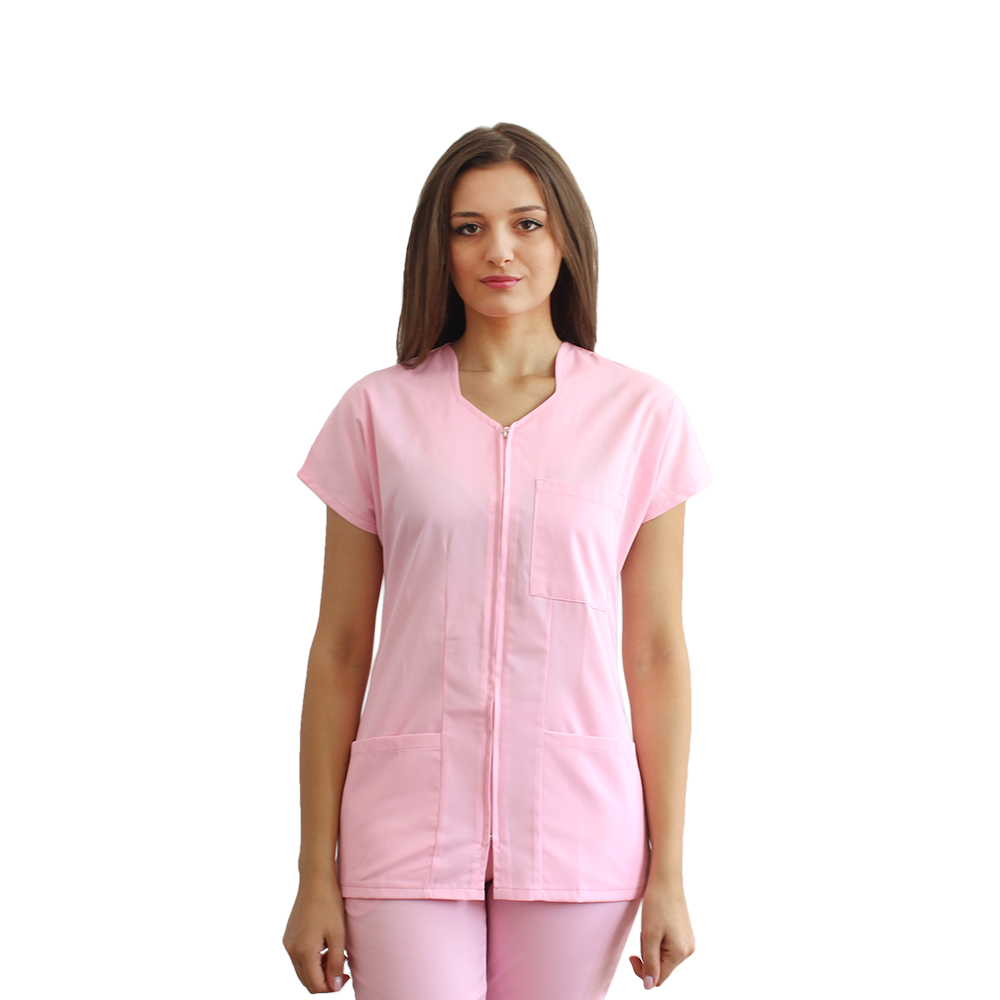 Bledo roza medicinska obleka z ukrivljeno bluzo z zadrgo, tremi naloženimi žepi in bledo rožnatimi elastičnimi hlačami