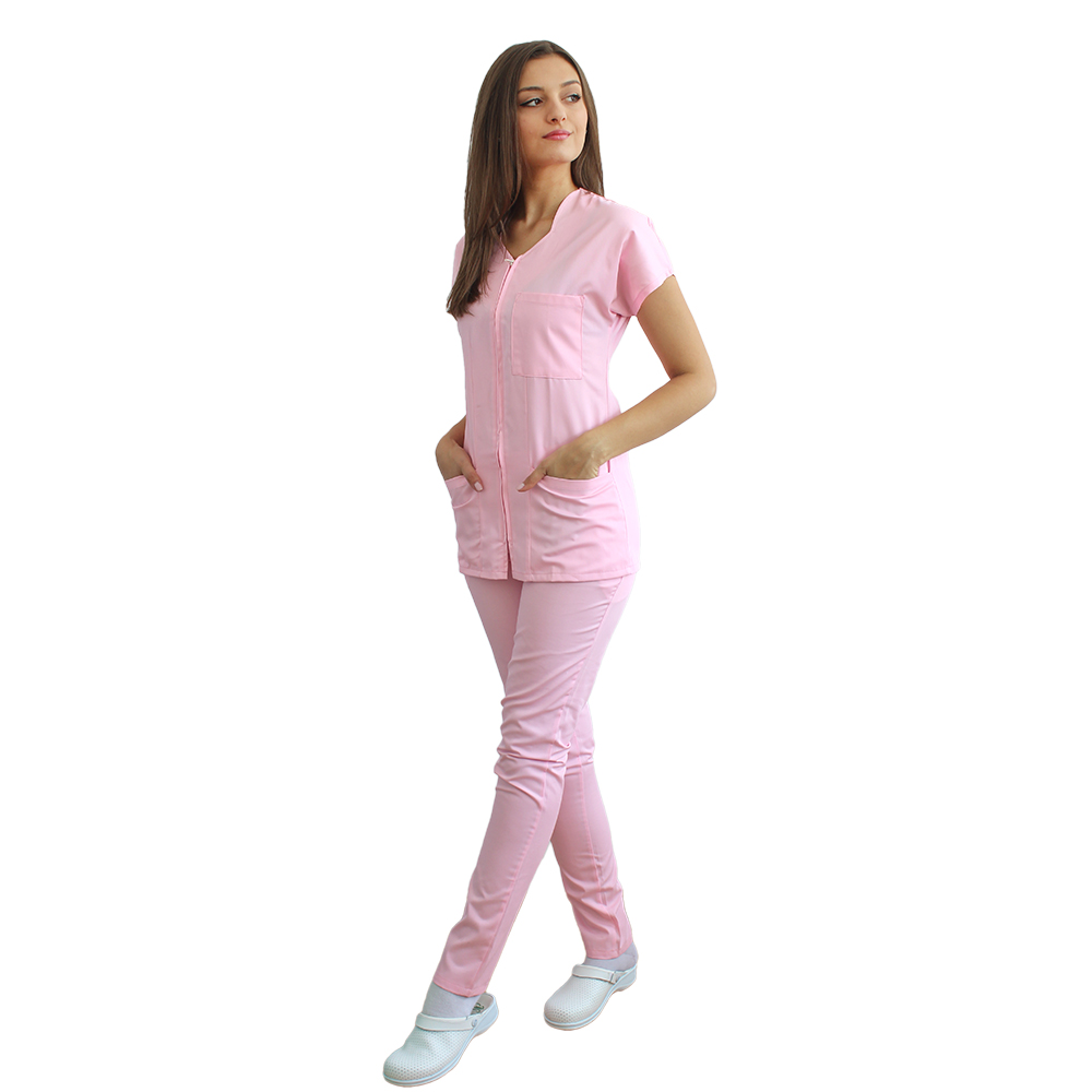 Bledo roza medicinska obleka z ukrivljeno bluzo z zadrgo, tremi naloženimi žepi in bledo rožnatimi elastičnimi hlačami